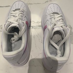 Nike Air Force ones that have been customised.